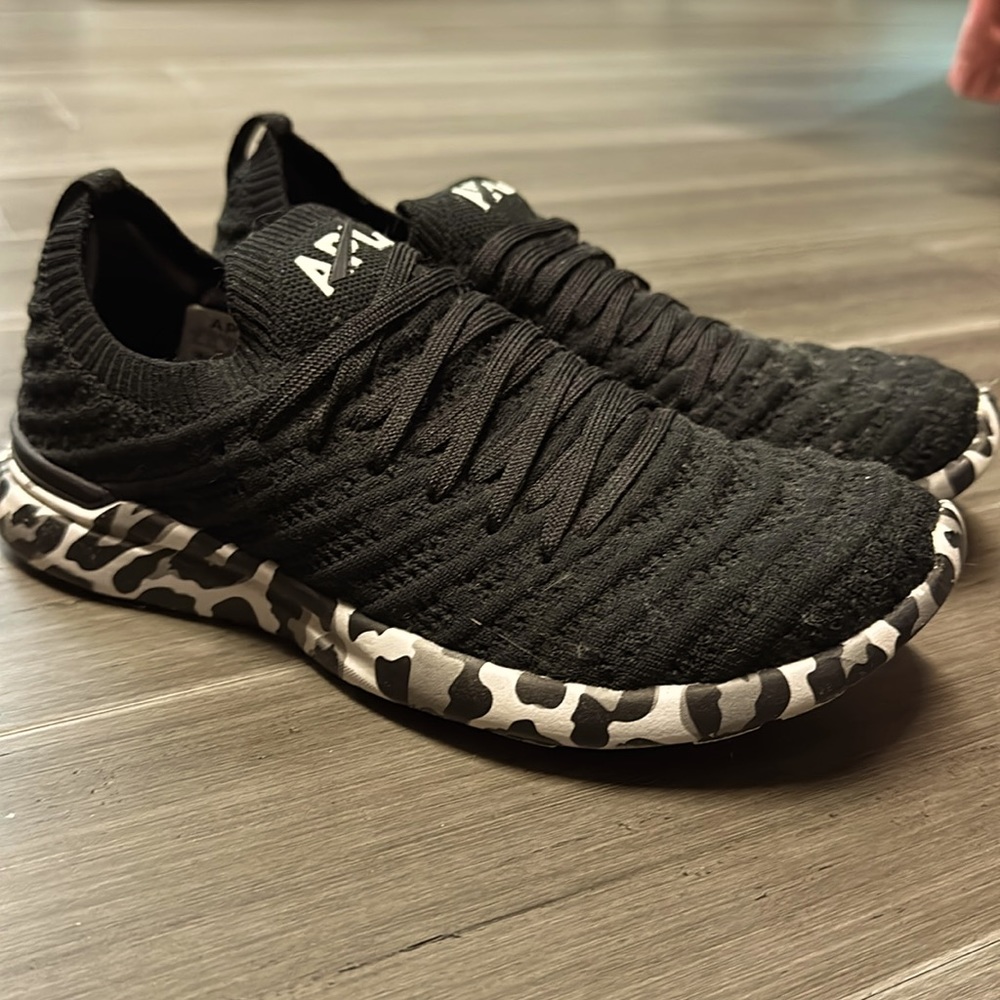 Black APL cheetah print sneakers